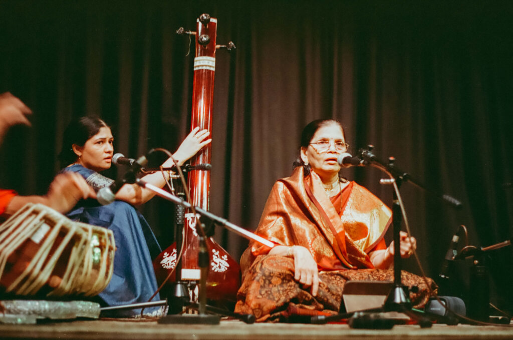 Shahana Kane accompanying Sukhada Kane on tanpura in performance
